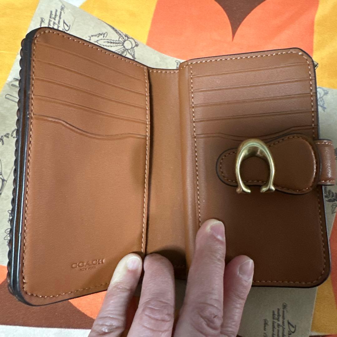 COACH ブラウン 二つ折り財布 編み込みデザイン