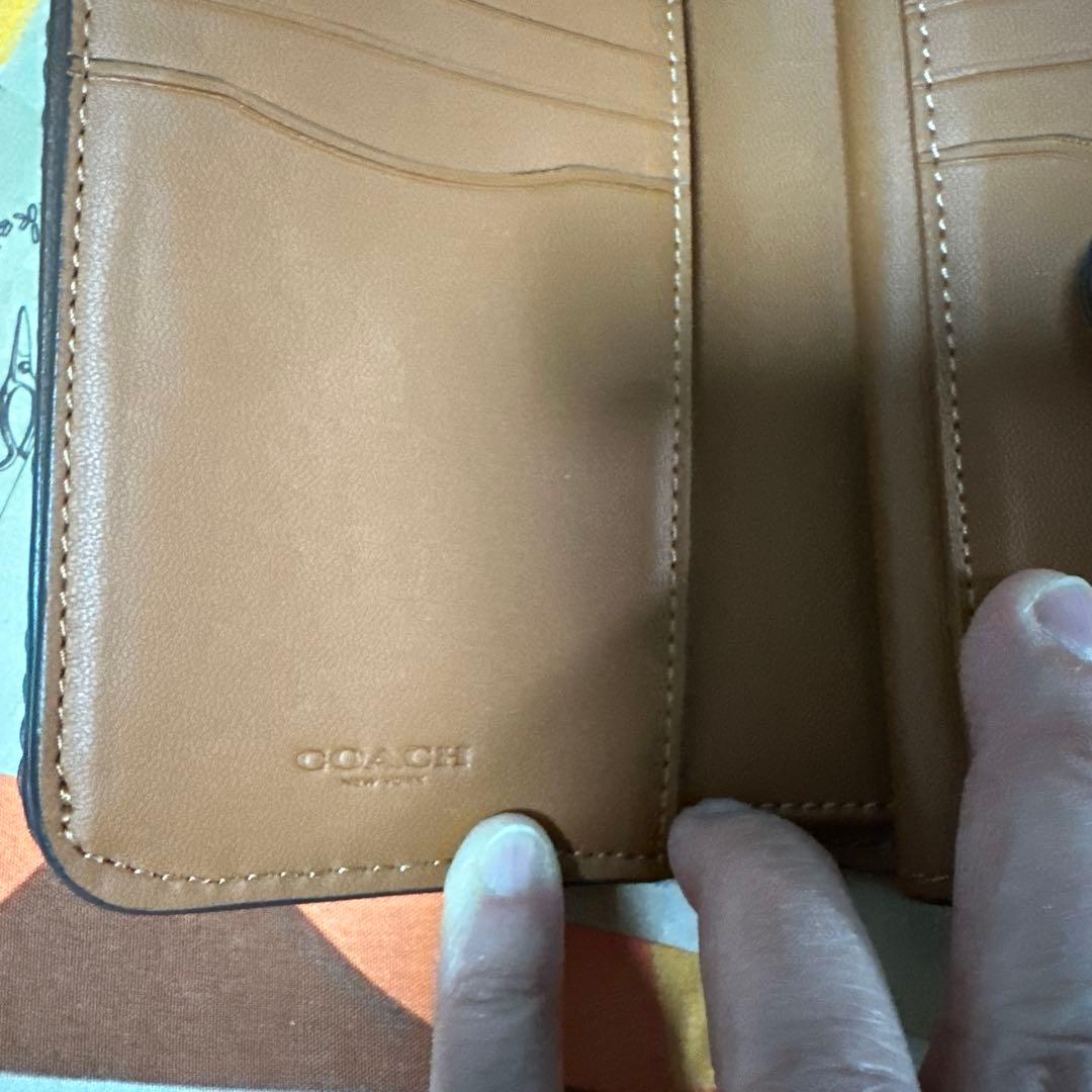 COACH ブラウン 二つ折り財布 編み込みデザイン