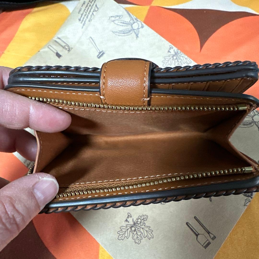 COACH ブラウン 二つ折り財布 編み込みデザイン