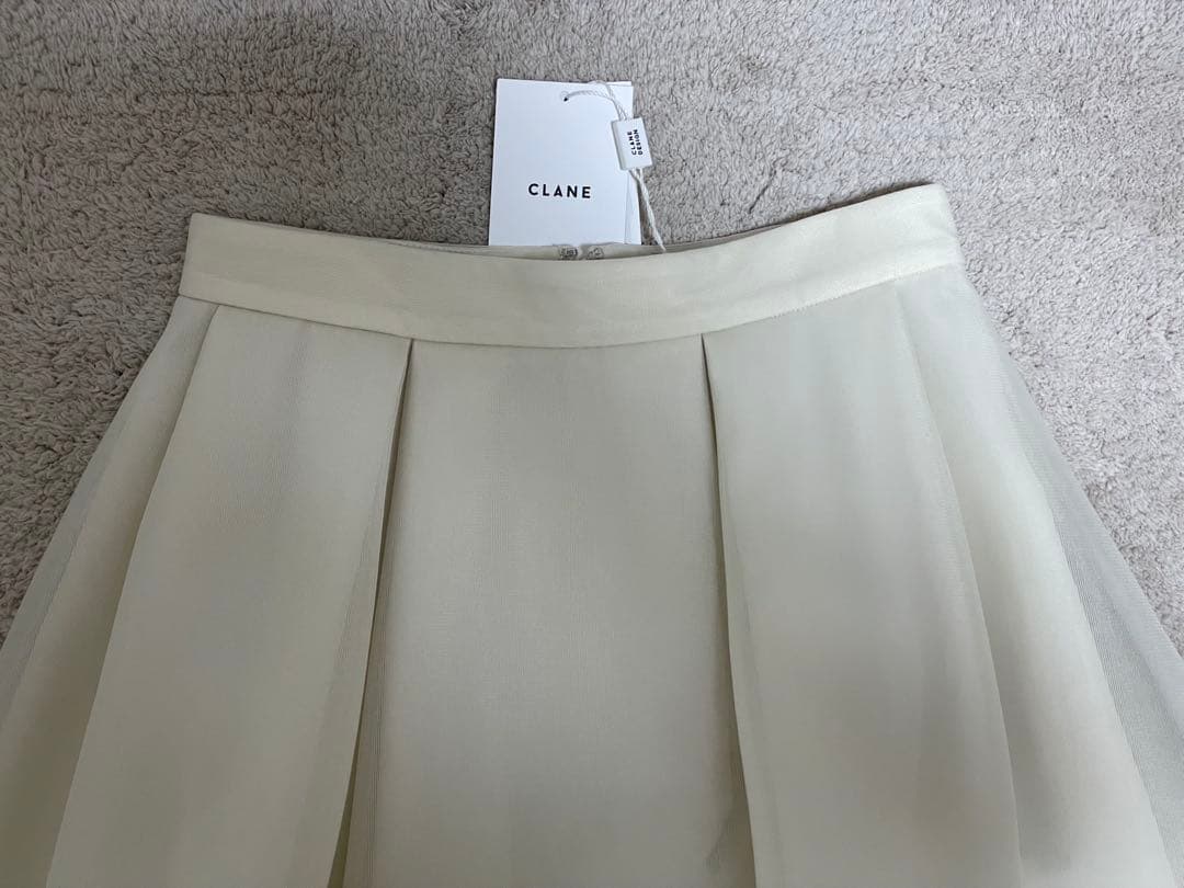 スカート CLANE SHEER RUSSELL VOLUME FLARE SKIRT