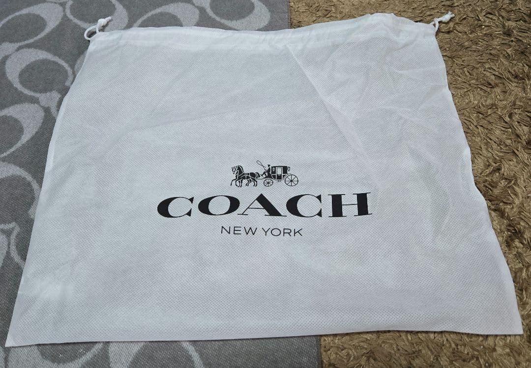 Coach ロゴストール グレー フリンジ付き