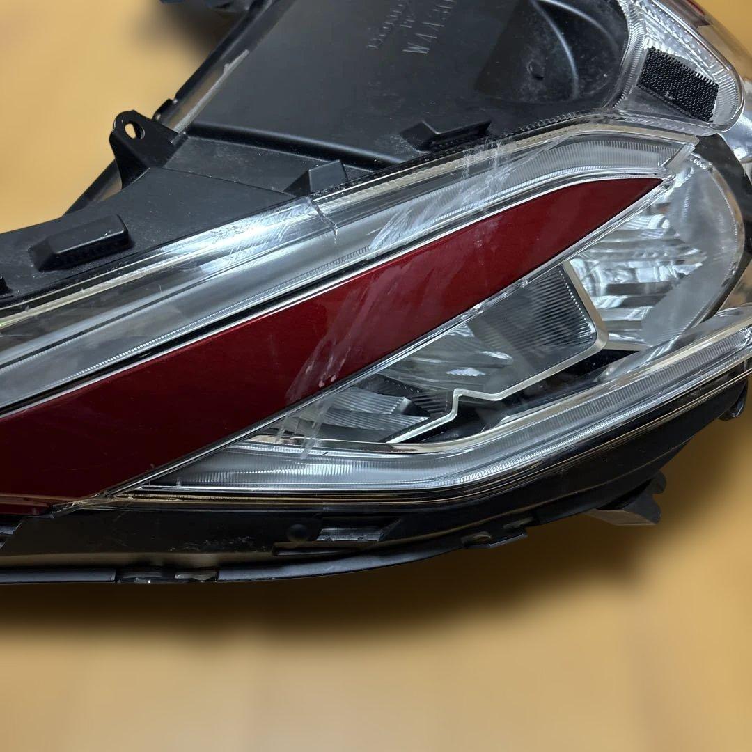 PCX125 ヘッドライトアッシー　JF81 割れあり