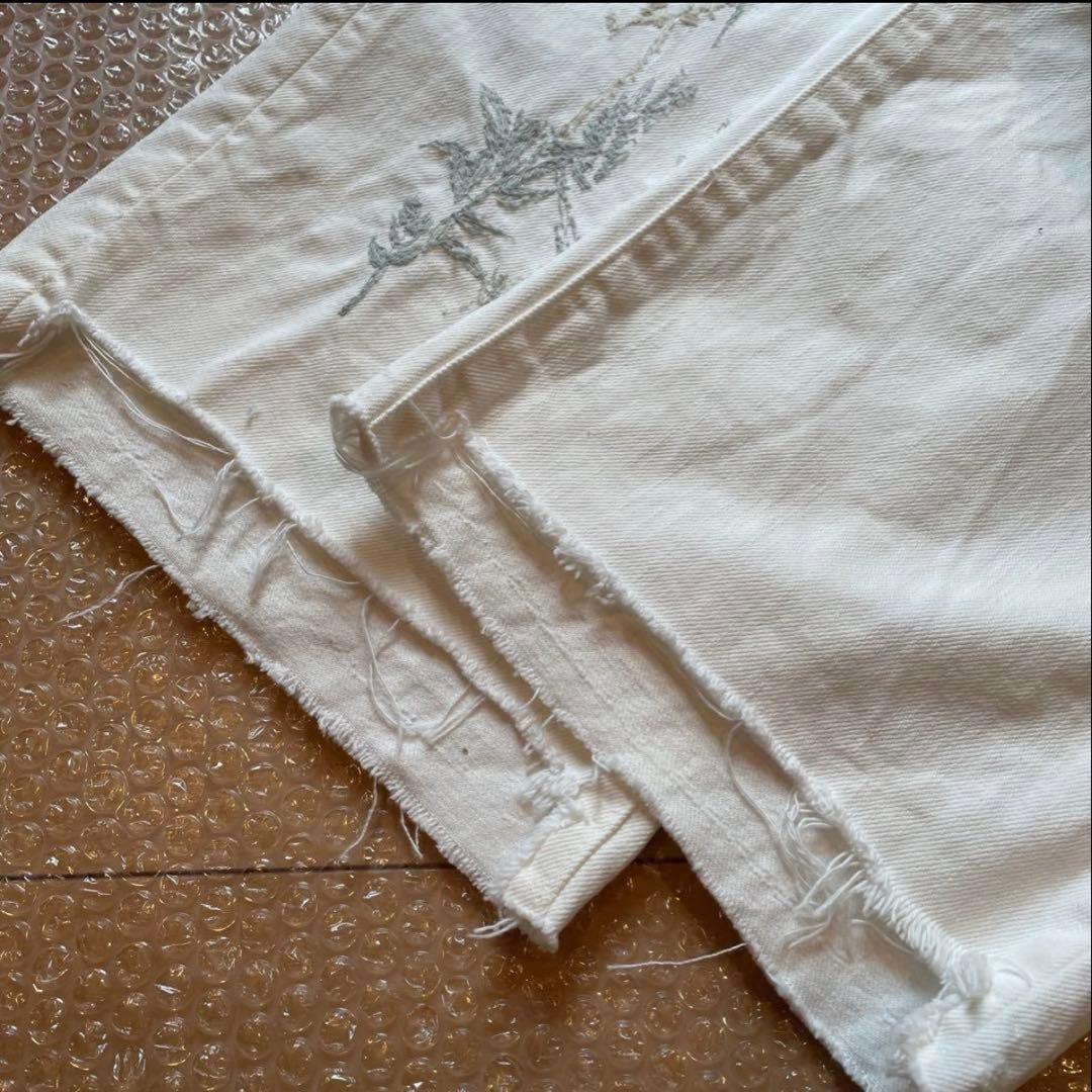 45R ライ麦ホワイトデニムのクロスオーバーパンツ遖加工（アネモネ刺繍）