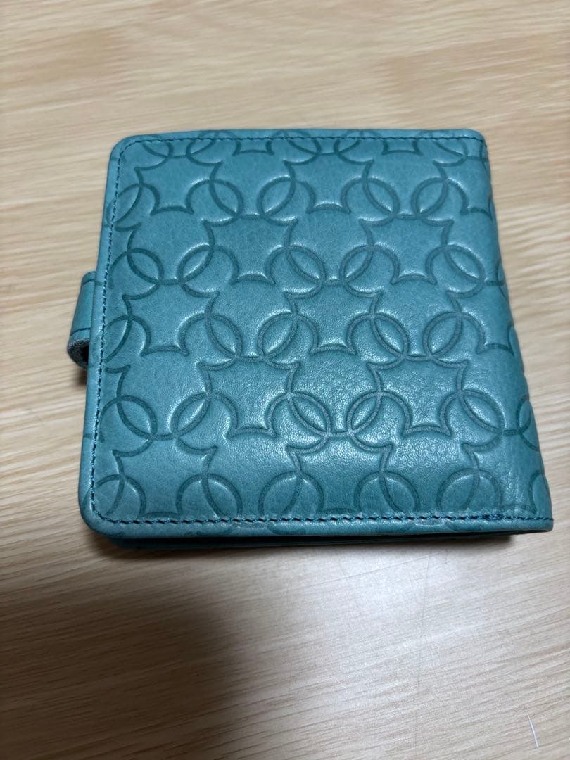 本革型押しミッキーモチーフ二つ折り財布