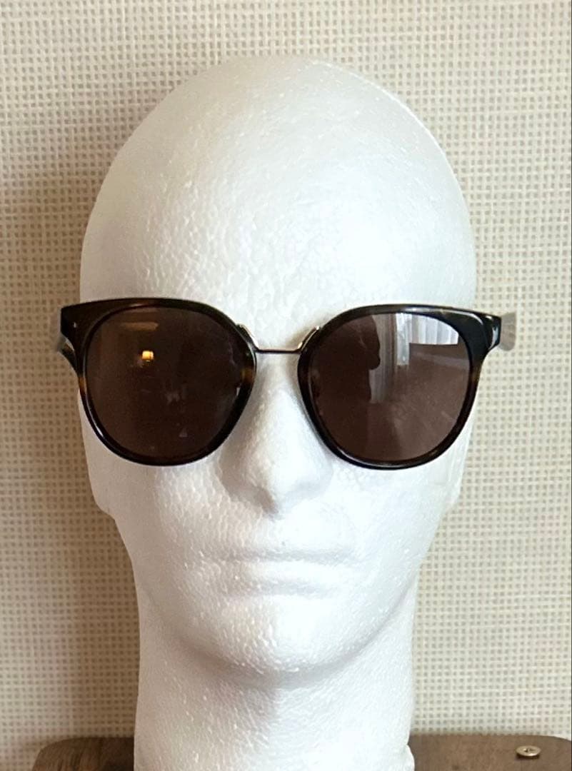 PRADAプラダ SPR17T ゴールドブリッジサングラス（ブラウン系）