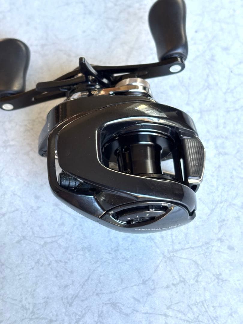 24メタニウムDC 70XG 右巻き　ドラグクリッカー組み込み
