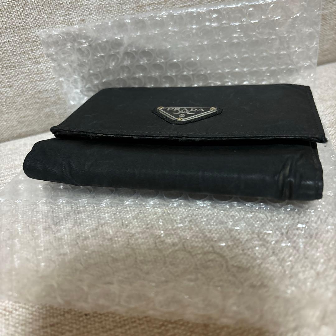 今だけ値下げ。美品。PRADA ブラック 三つ折り財布男女兼用。