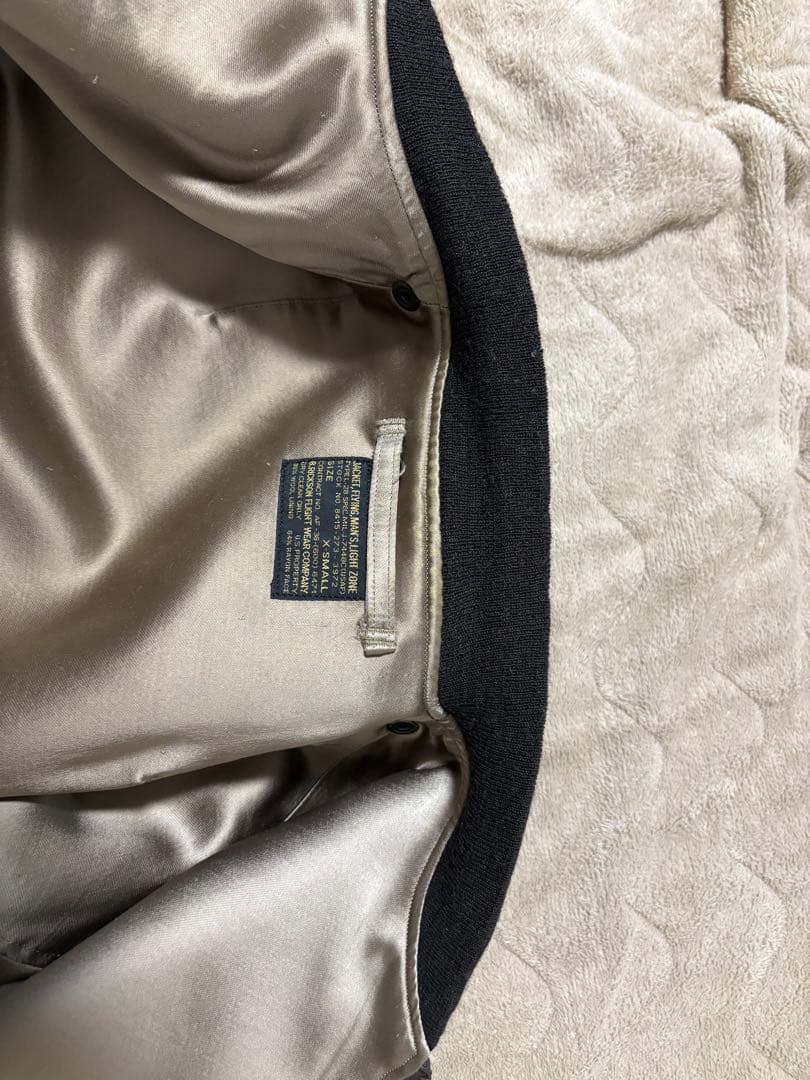 UNUSED × BUZZ RICKSON’S L-2B 別注 フライトJK