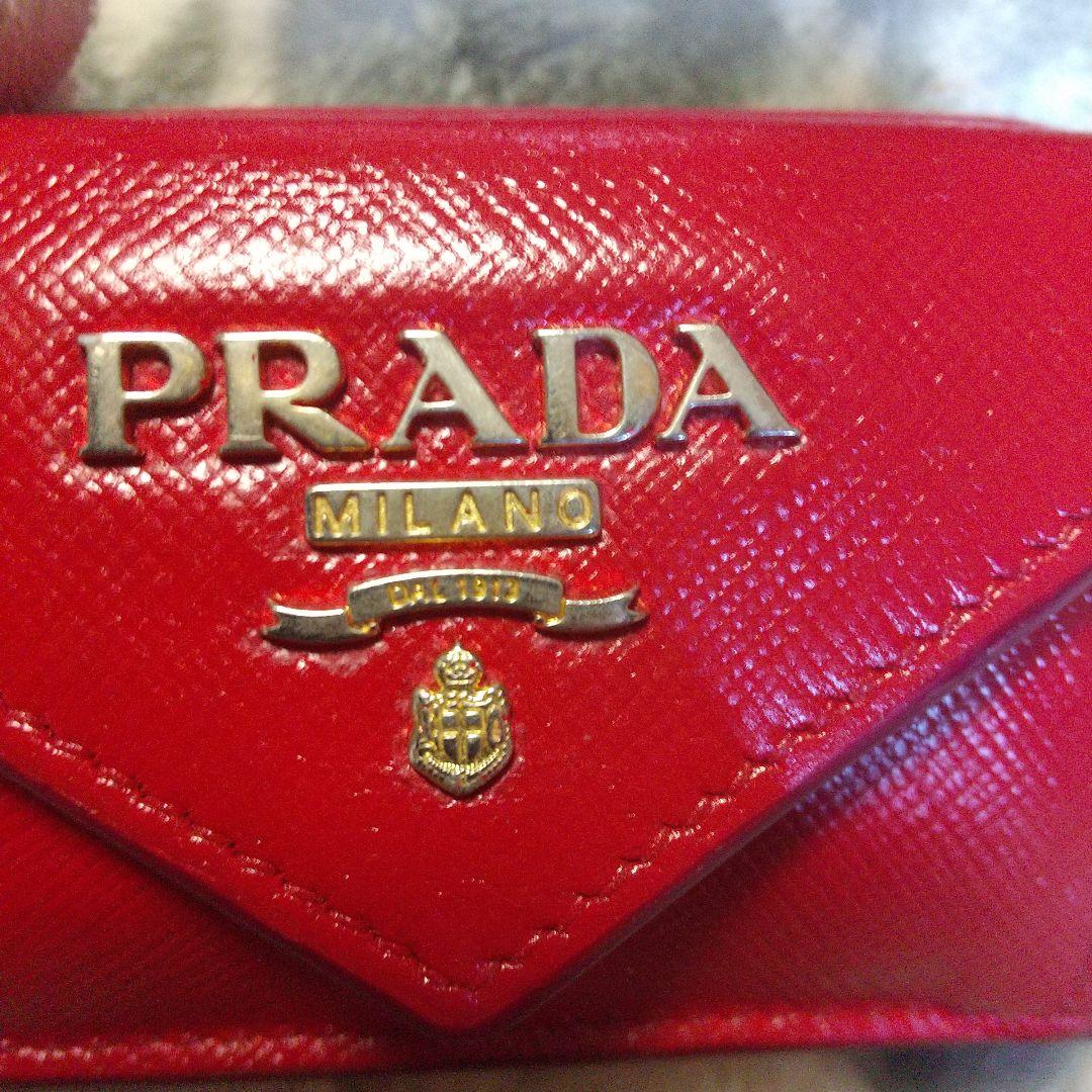 プラダPRADA　サフィアーノ コンパクトウォレット レッド系