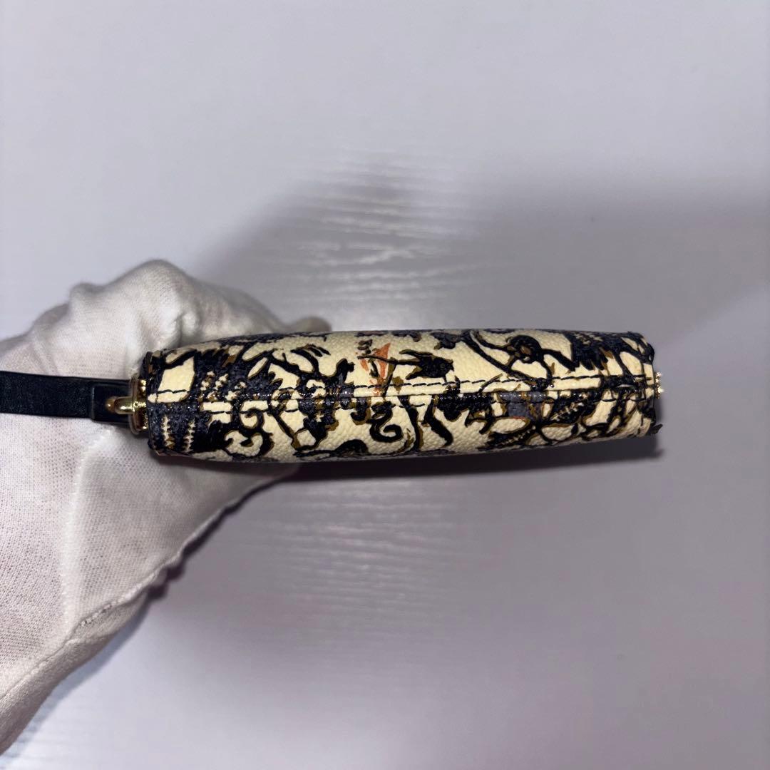 0034 TORY BURCH 総柄 ラウンドファスナー TTロゴ 折り財布