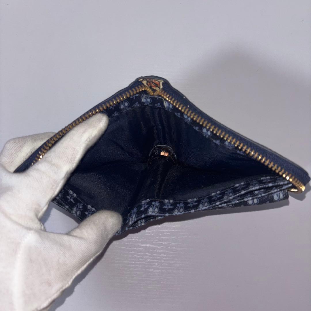 0034 TORY BURCH 総柄 ラウンドファスナー TTロゴ 折り財布