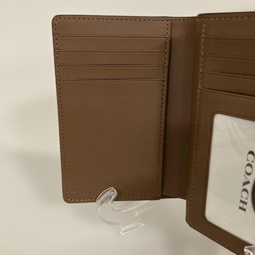 〔新品　未使用〕COACHコーチ　シグネチャー 二つ折り財布