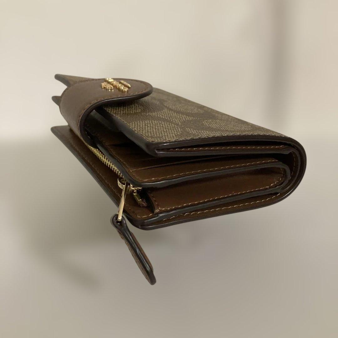 〔新品　未使用〕COACHコーチ　シグネチャー 二つ折り財布