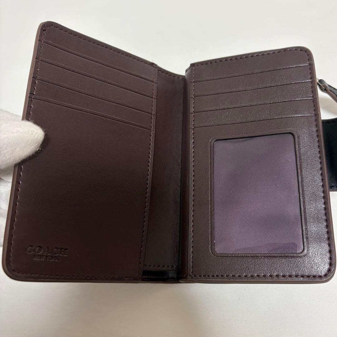 ほぼ未使用 コーチ シグネチャー 型押し 2つ折り財布 ラウンドジップ ブラック