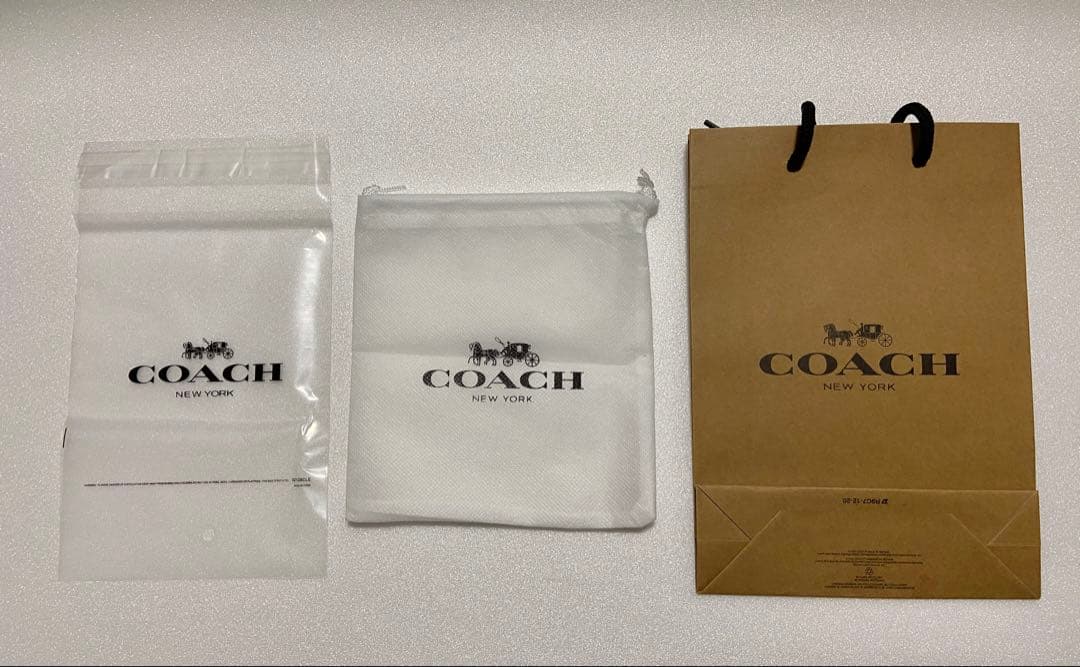 【新品未使用】COACH コーチ 二つ折り財布 ブラウンCR791