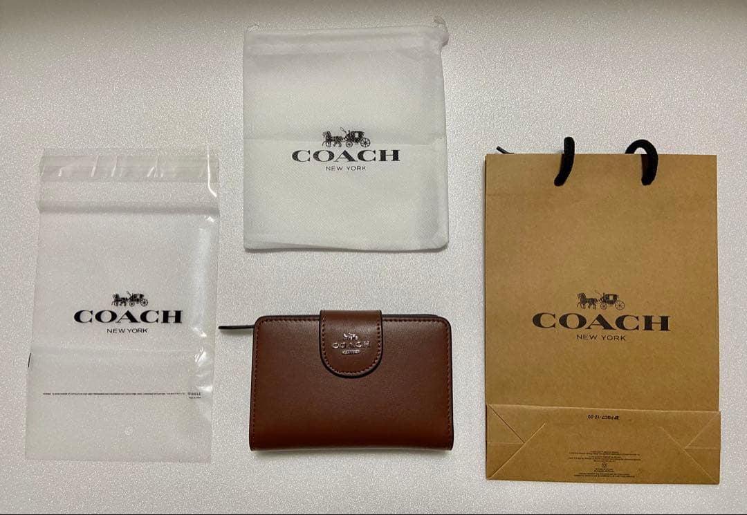 【新品未使用】COACH コーチ 二つ折り財布 ブラウンCR791