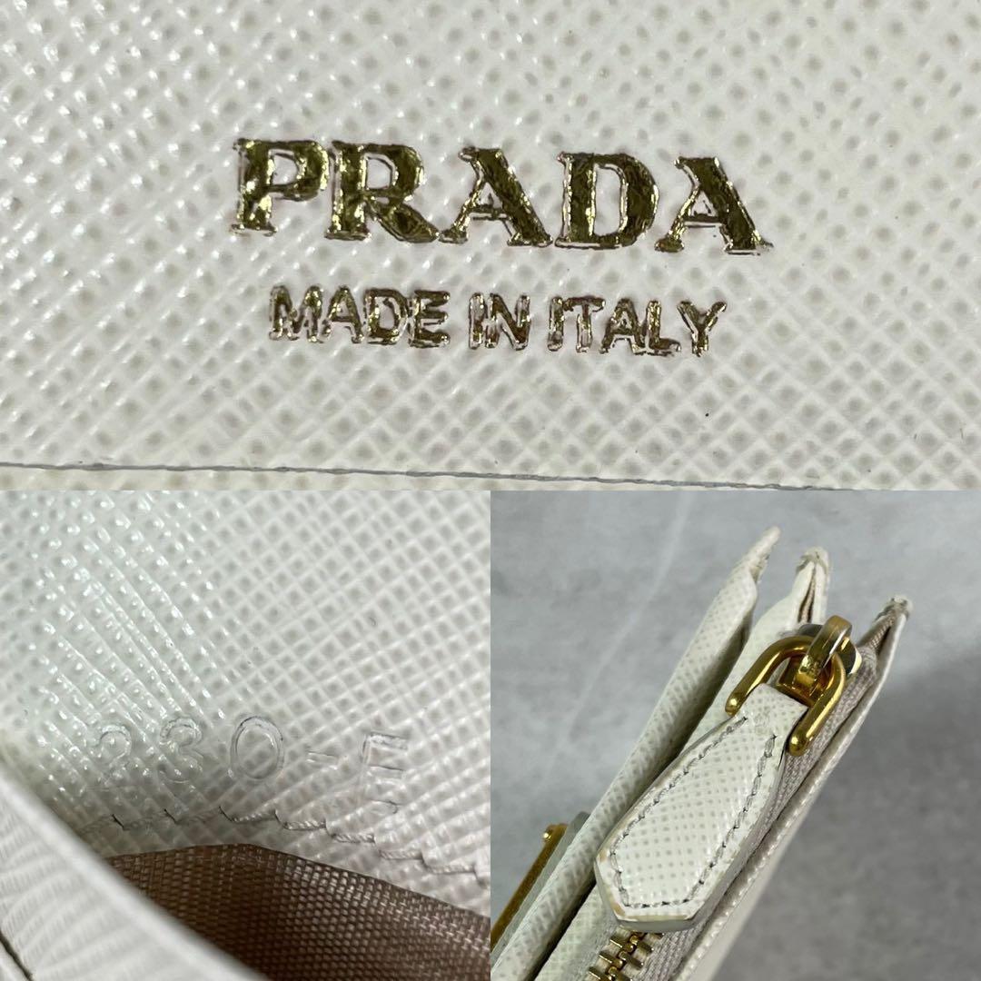 ももんが！定価10万✨PRADA 二つ折り財布 サフィアーノトライアングル