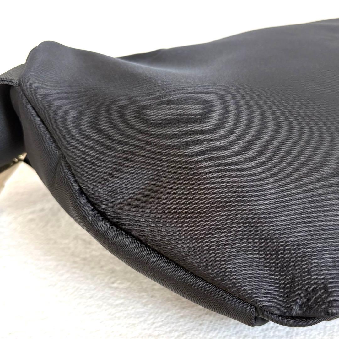 あんあん様⭐︎美品【TOCCA】ボディバッグ リボン ゴールド金具 ナイロン 黒