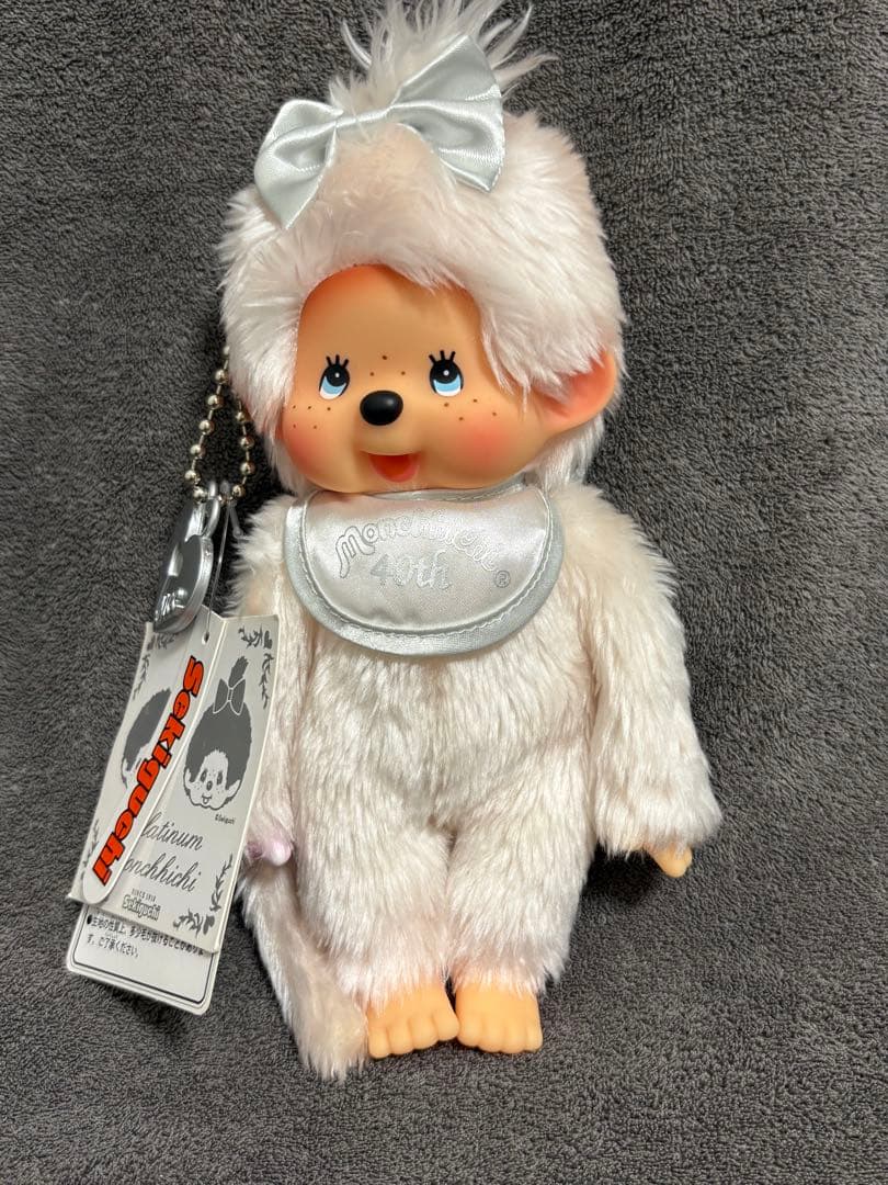 め*ゆ様 新品 40周年 プラチナ 女の子 モンチッチ monchhichi