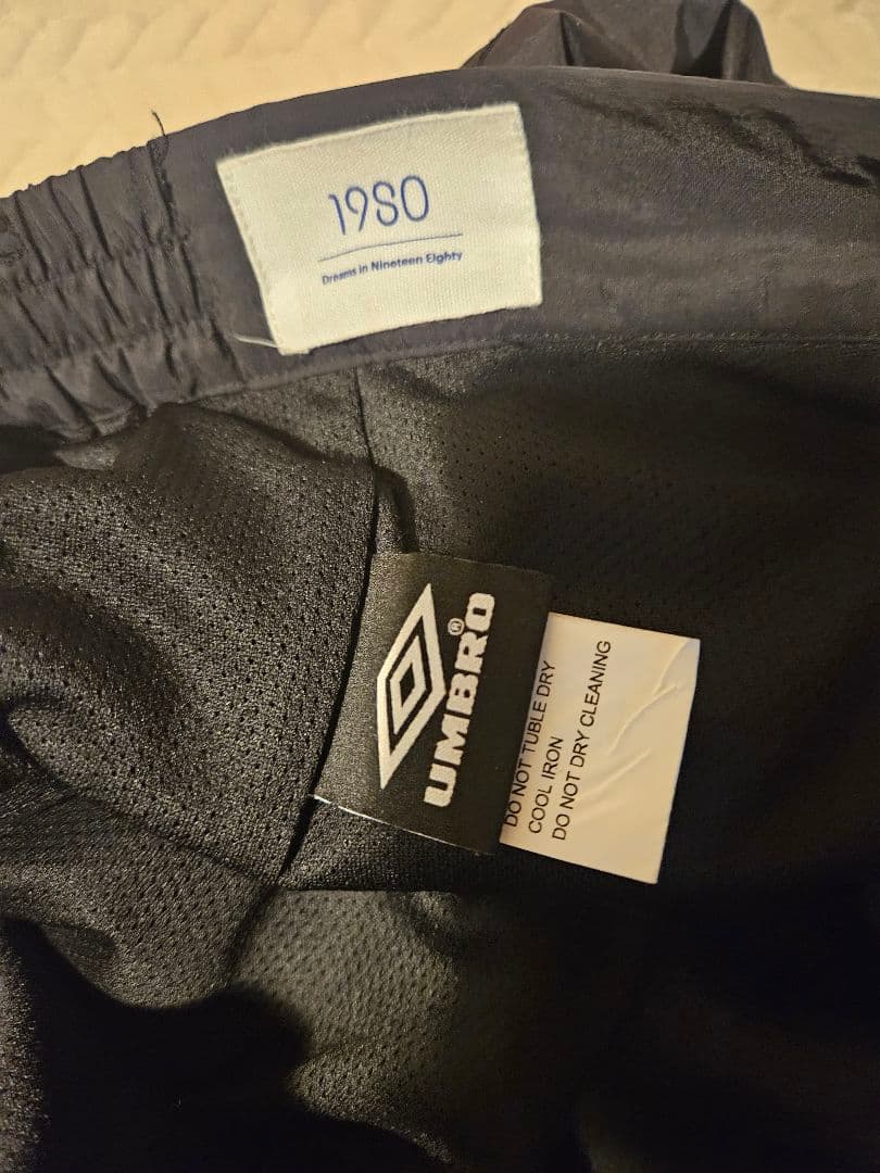 19so × UMBRO ナイロンパンツ