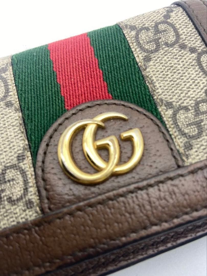 ゲ*！様 GUCCI 二つ折り財布 オフディア　シェリーライン