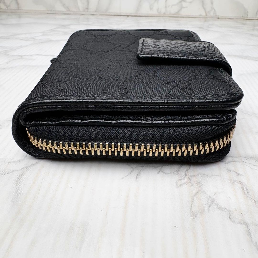 08 未使用級 GUCCI 二つ折り財布 ラウンドファスナー 黒 mg5