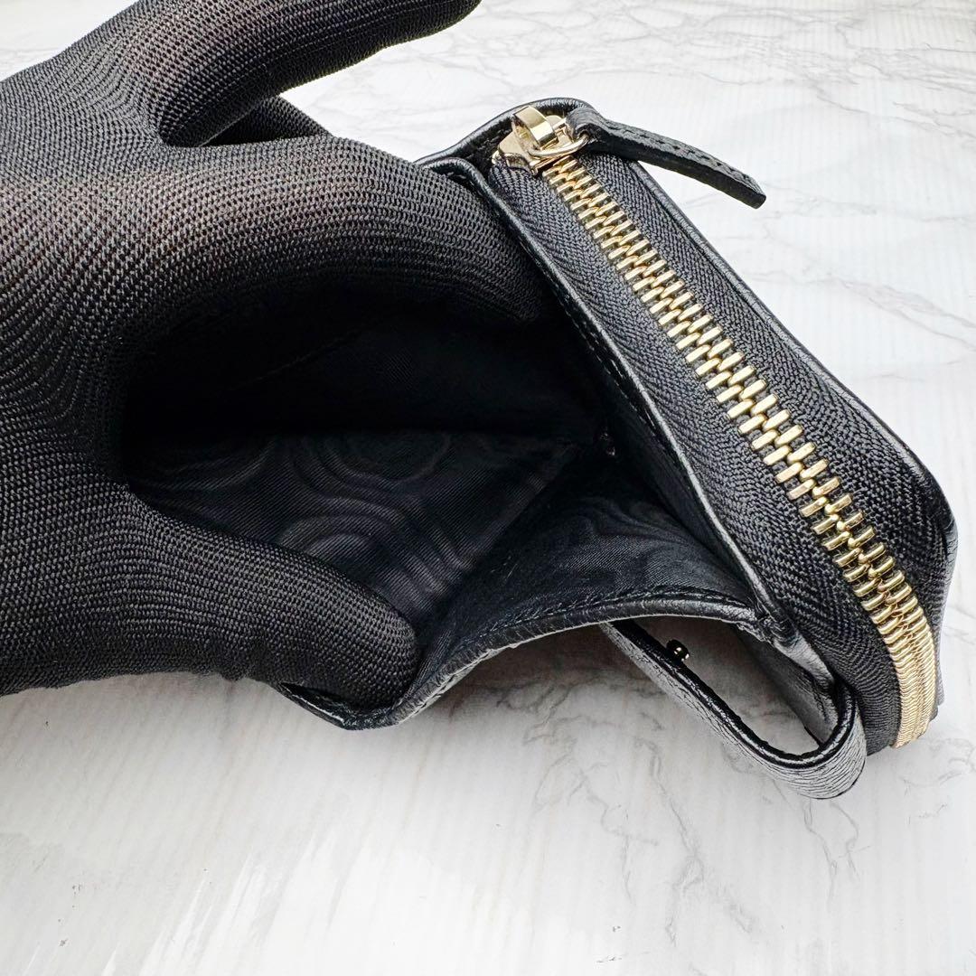 08 未使用級 GUCCI 二つ折り財布 ラウンドファスナー 黒 mg5