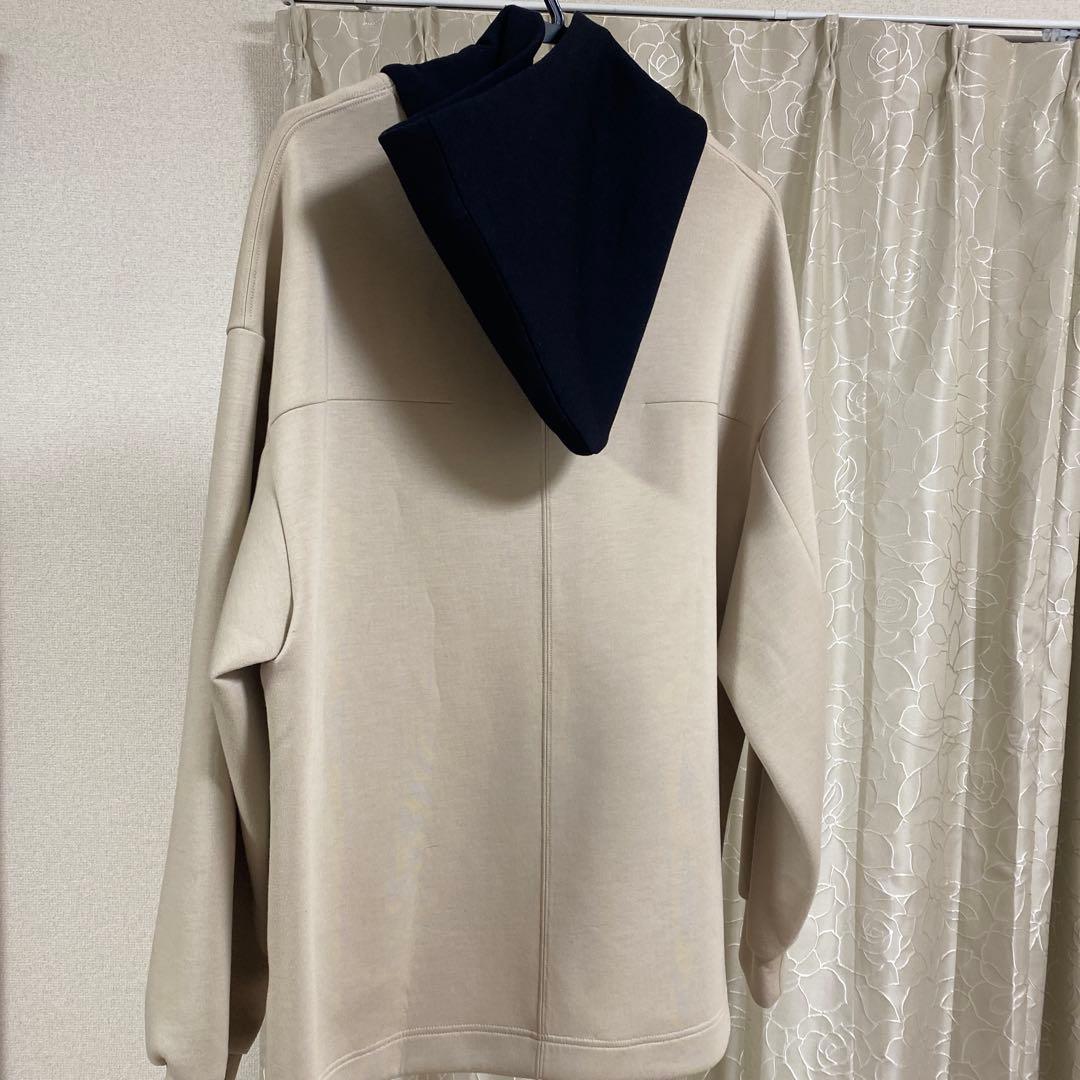 CULLNI ベージュ ネイビー フード付きジャンパー
