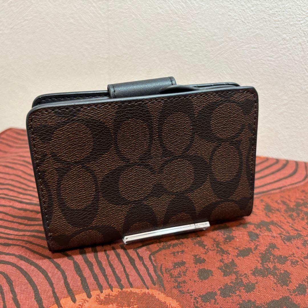 【美品】COACHコーチ 二つ折り財布 シグネチャー ブラウン
