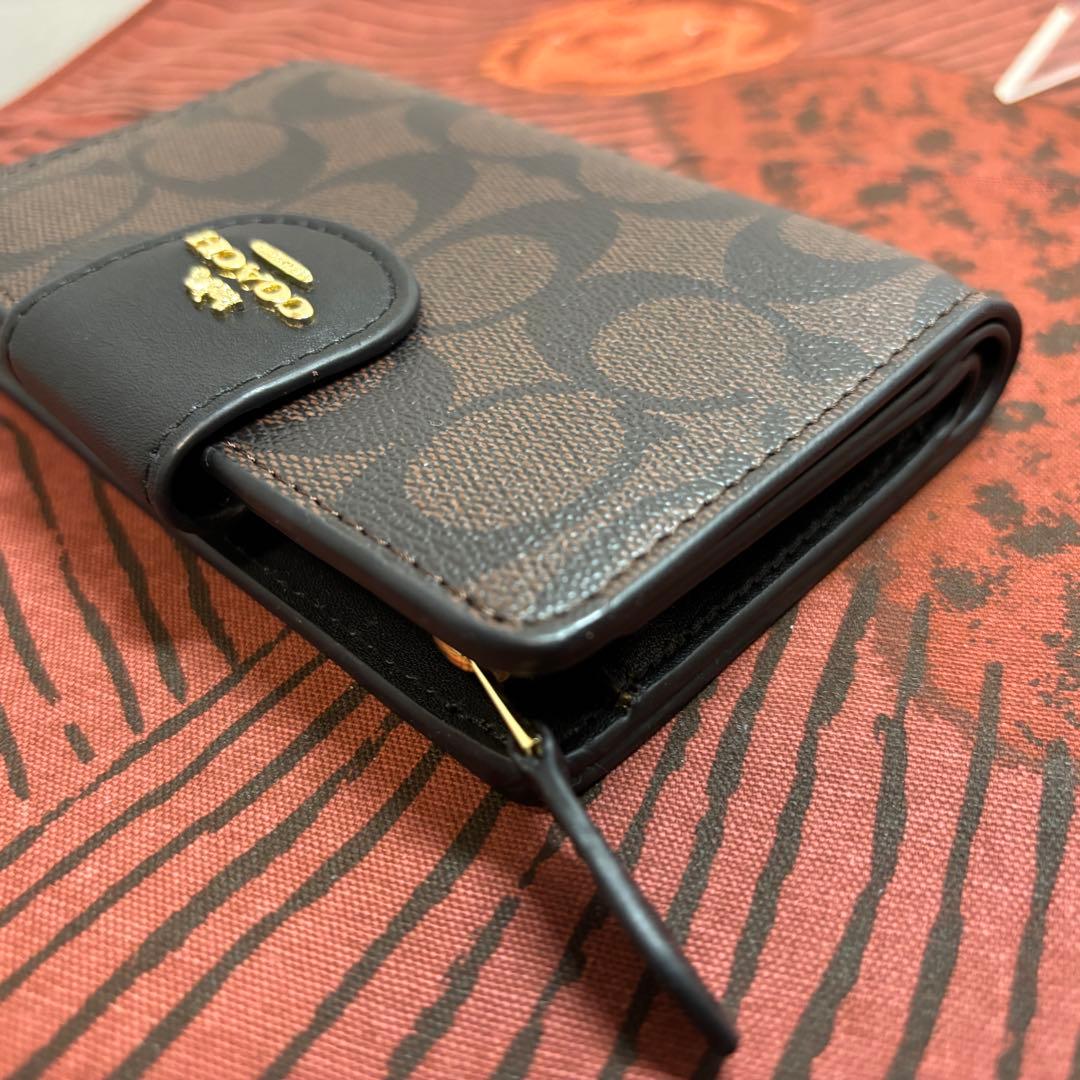 【美品】COACHコーチ 二つ折り財布 シグネチャー ブラウン
