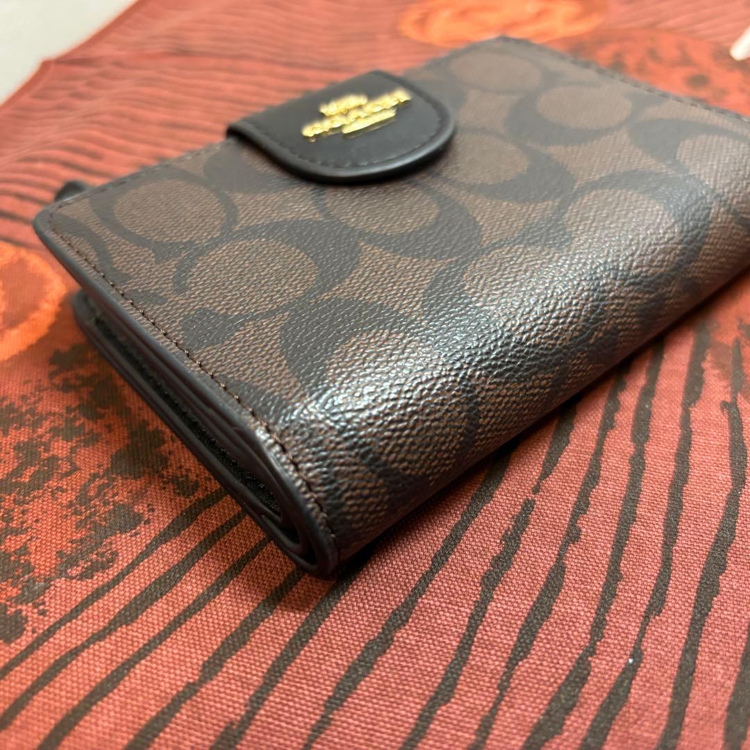 【美品】COACHコーチ 二つ折り財布 シグネチャー ブラウン
