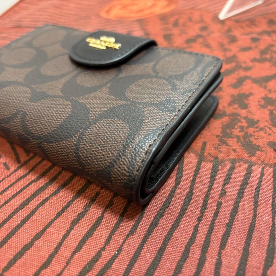 【美品】COACHコーチ 二つ折り財布 シグネチャー ブラウン