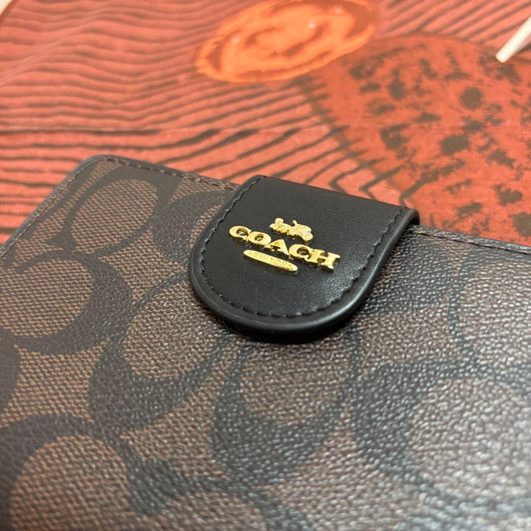 【美品】COACHコーチ 二つ折り財布 シグネチャー ブラウン