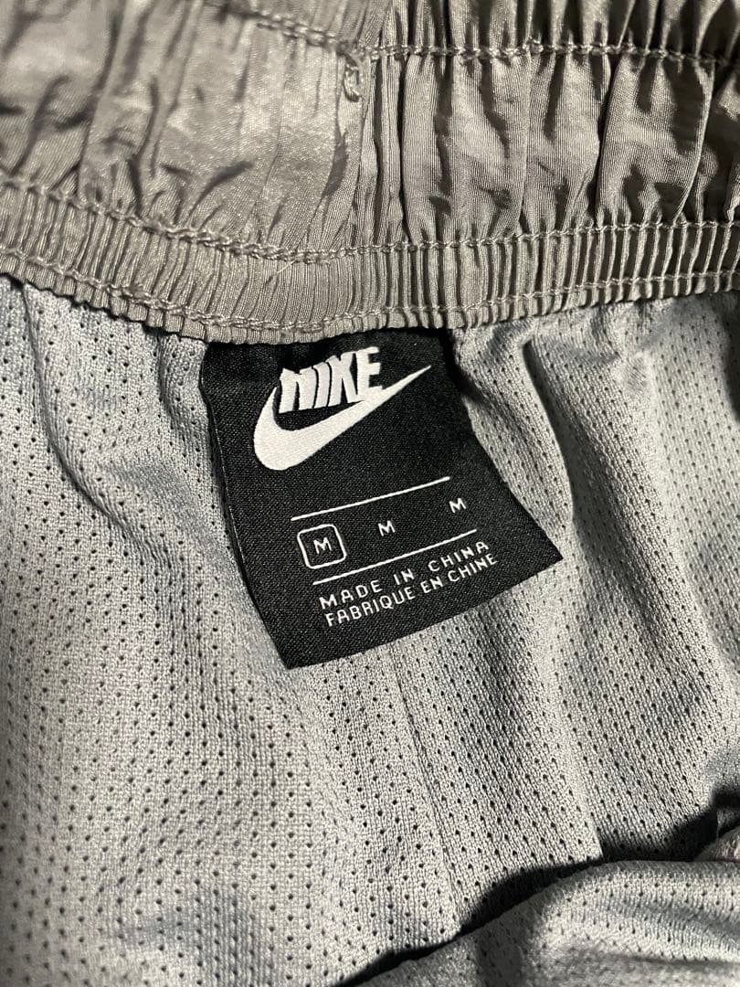 Nike グレー トラックパンツ サイドストライプ