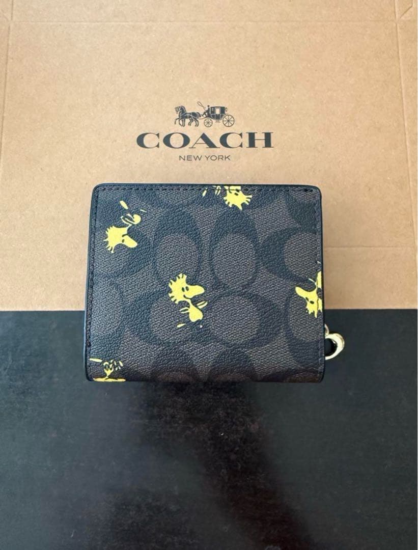 COACH 二つ折り財布 黒/黄色