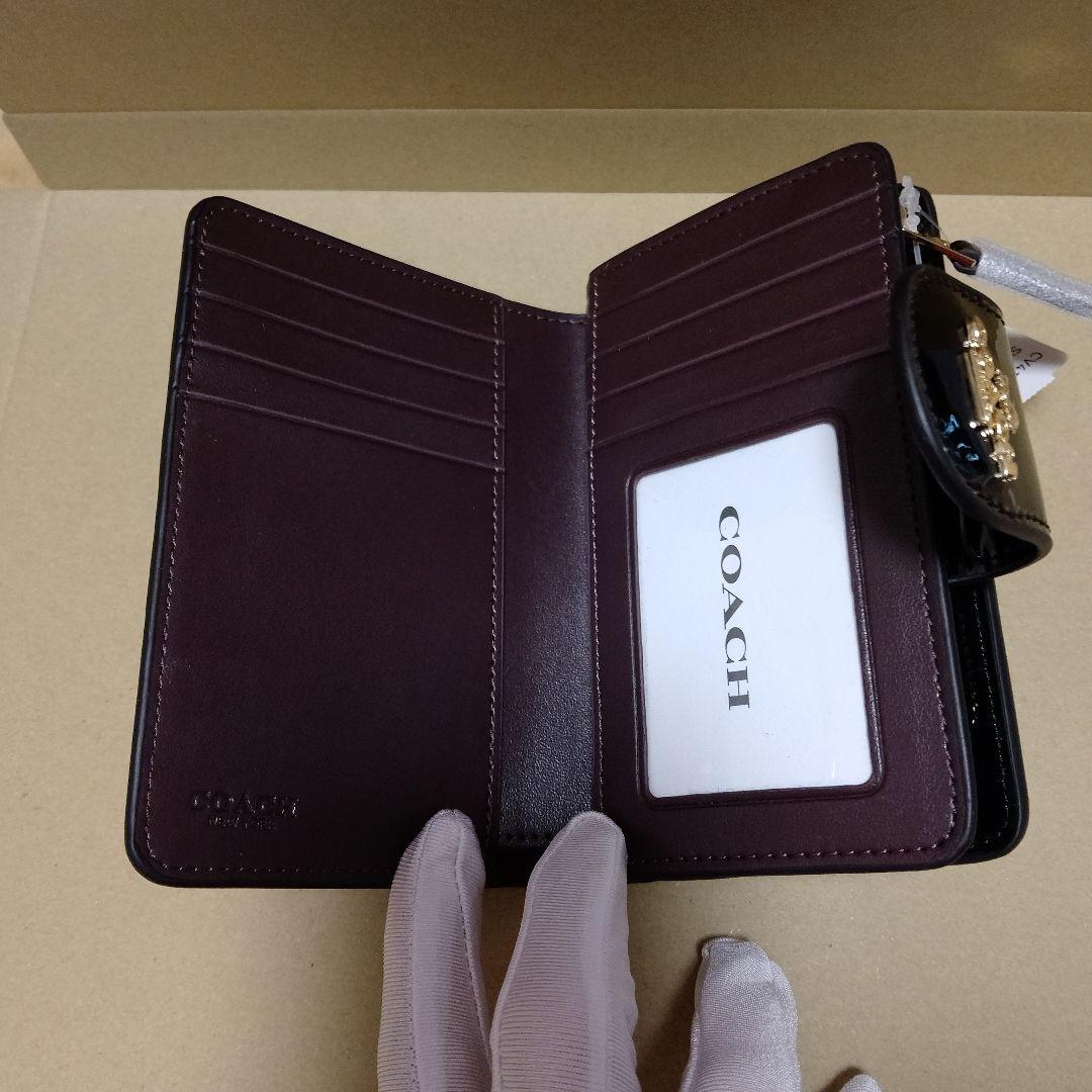【オープン価格】COACH シグネチャーエンボス加工 二つ折り財布