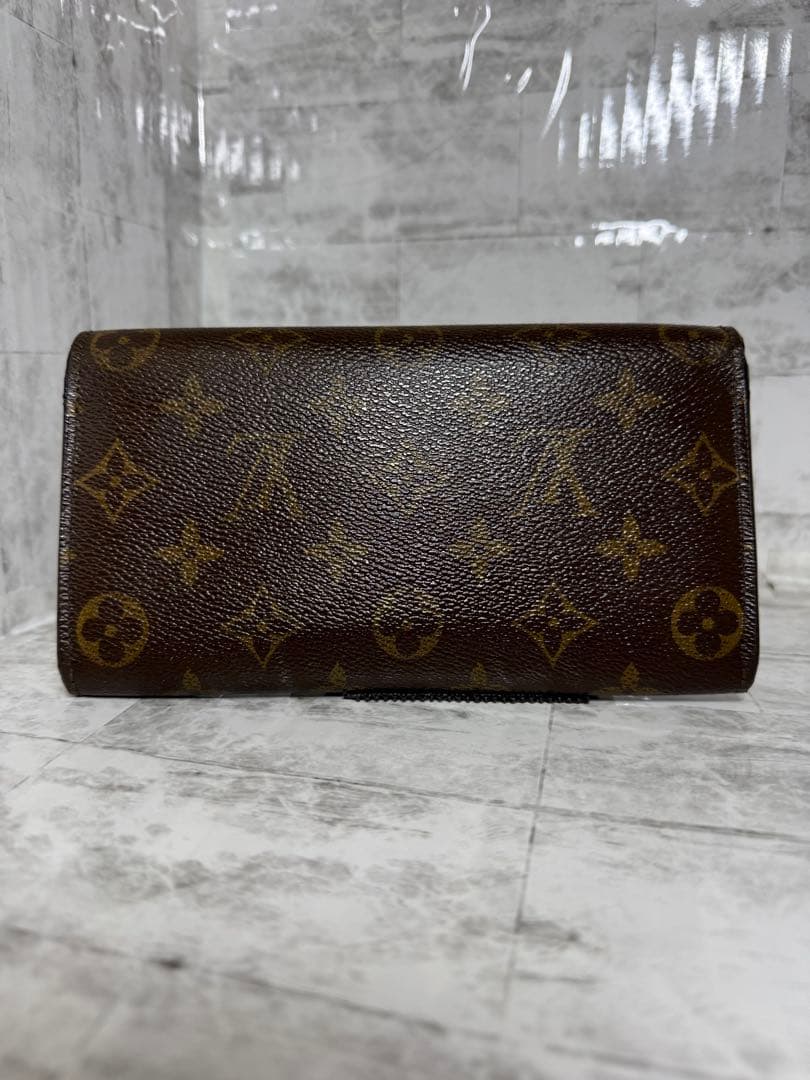 ルイ・ヴィトン 二つ折りフラップ長財布 モノグラム　中古