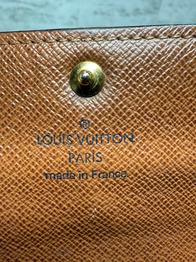 ルイ・ヴィトン 二つ折りフラップ長財布 モノグラム　中古