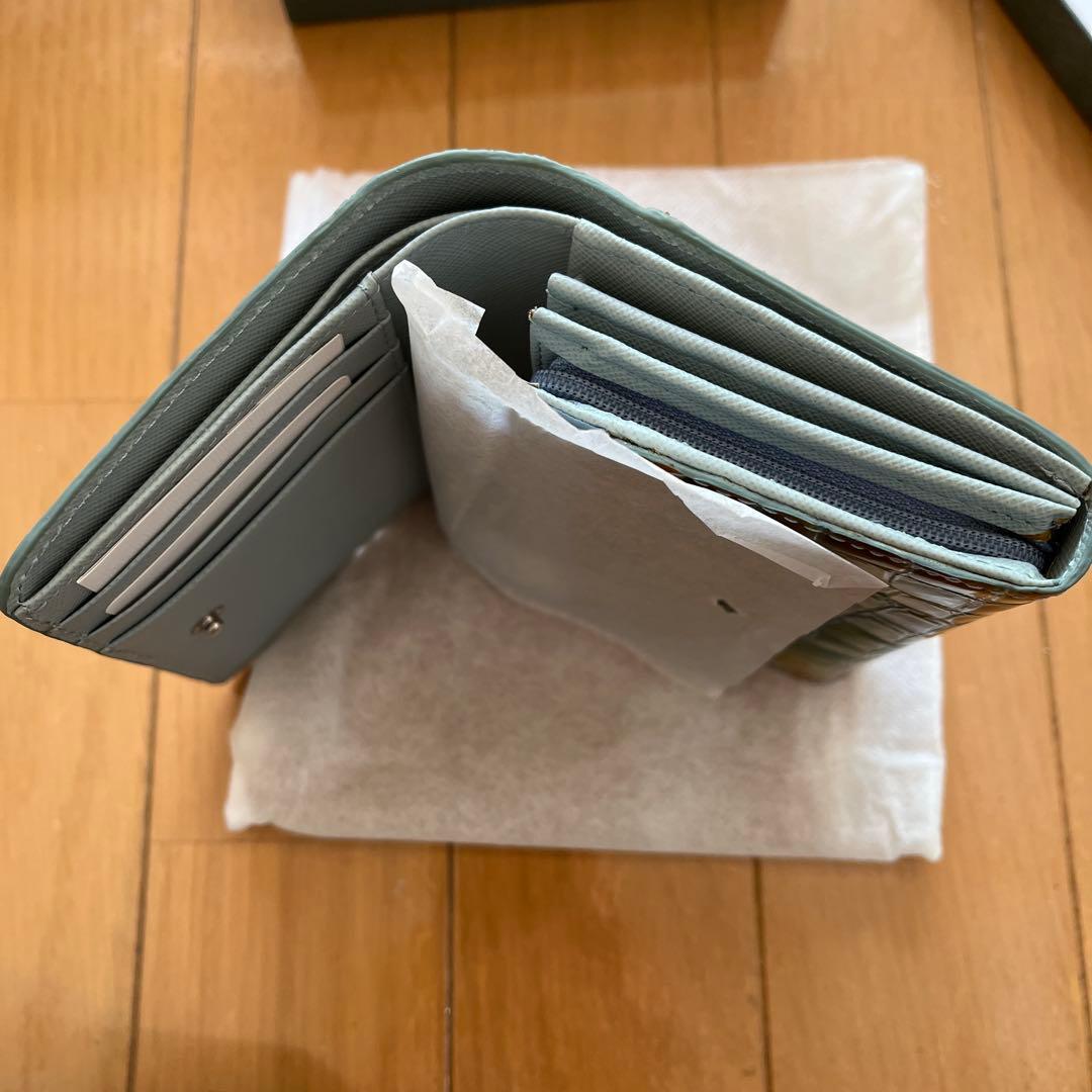 新品COCCO FIOREクロコダイル風 二つ折り財布 金運イエロー系ハート