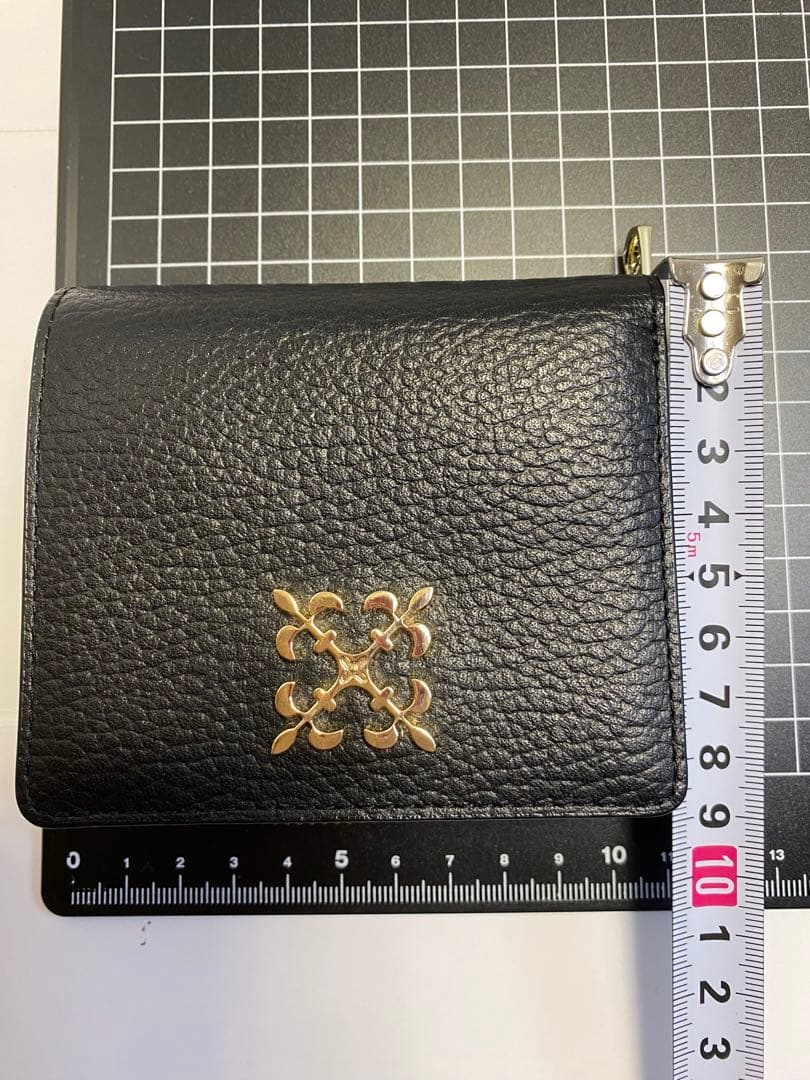 新品未使用ラシットrusset モノグラムプレート二つ折りジップハーフウォレット
