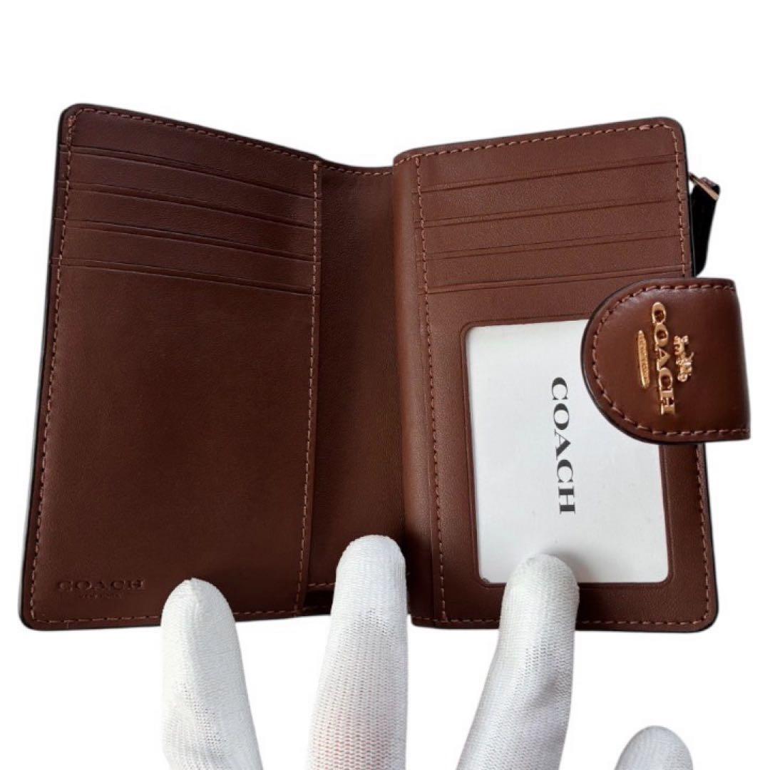 みー様 新品未使用✨COACHのシグネチャーキャンバスミディアムコーナージップ