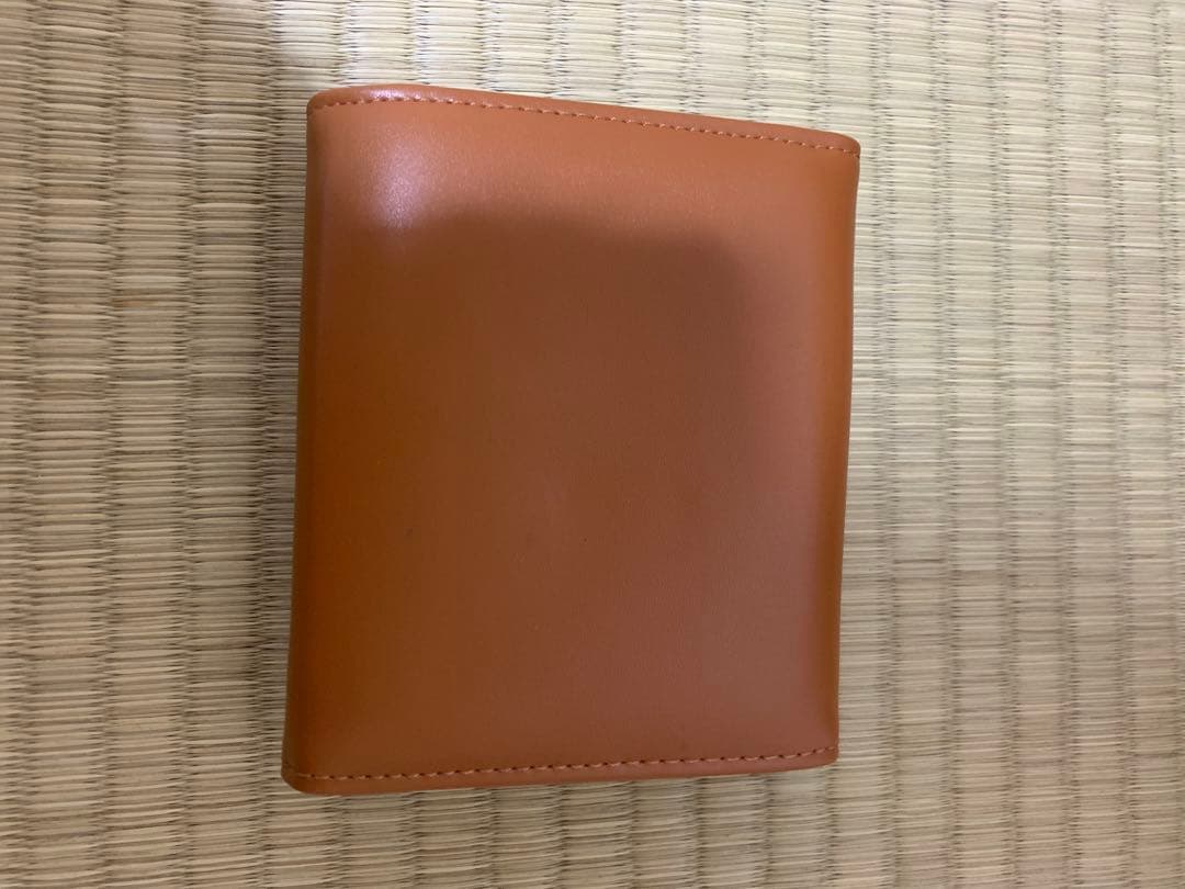 CELINEブラウン 三つ折り財布 特徴的金具