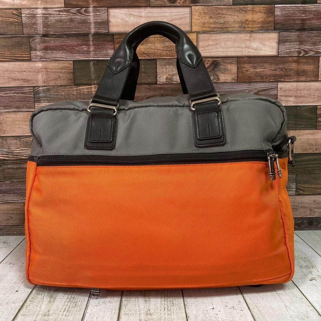 トゥミ　TUMI　ボストンバッグ　オレンジ　ネームタグ　ビジネス　2way