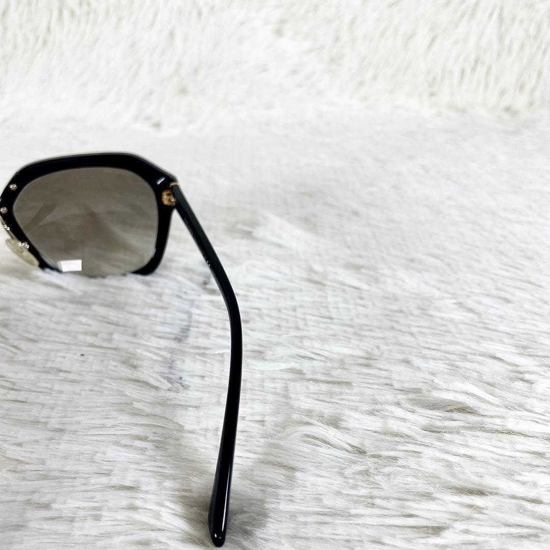 PRADA　プラダ　サングラス　SPR25R　ブラックレンズ・フレーム　訳アリ