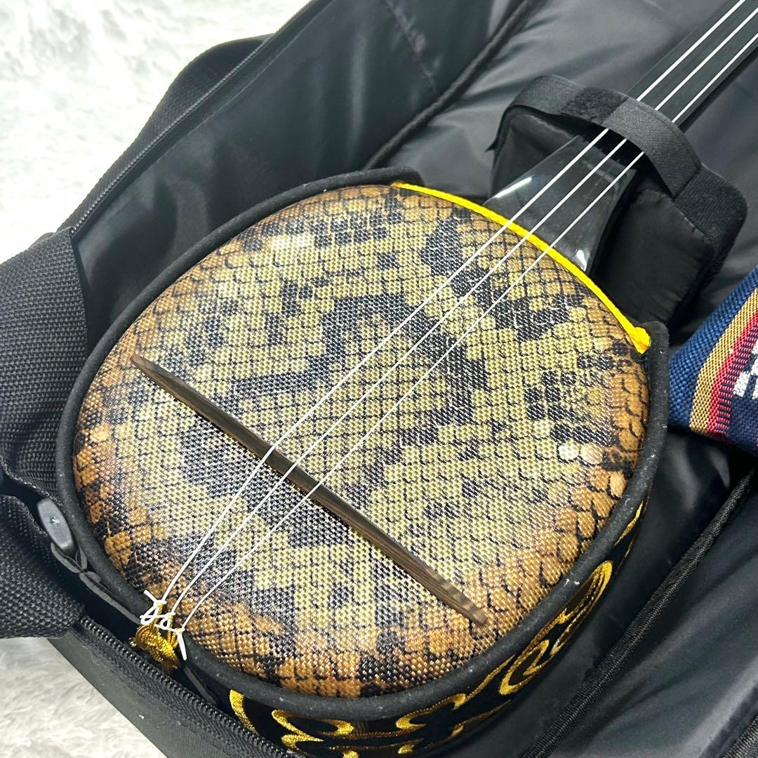 【美品】沖縄三線　蛇柄　人工皮仕様　三味線タイプ　リュックケース付き