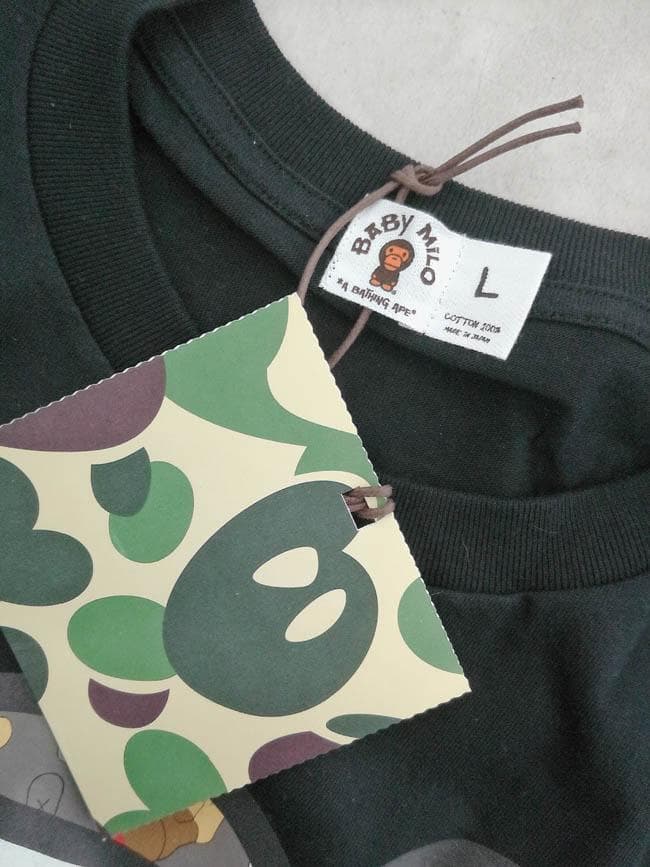 新品 ア ベイシング エイプ BAPE × KAWS カウズ マイロ TシャツL