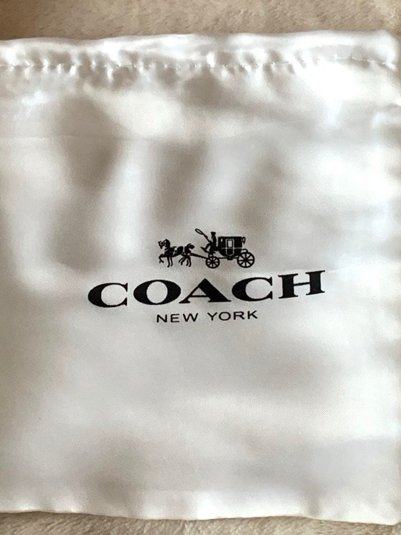 ［新品未使用品］COACH 二つ折り財布 ブラウン/レッドシグネチャー