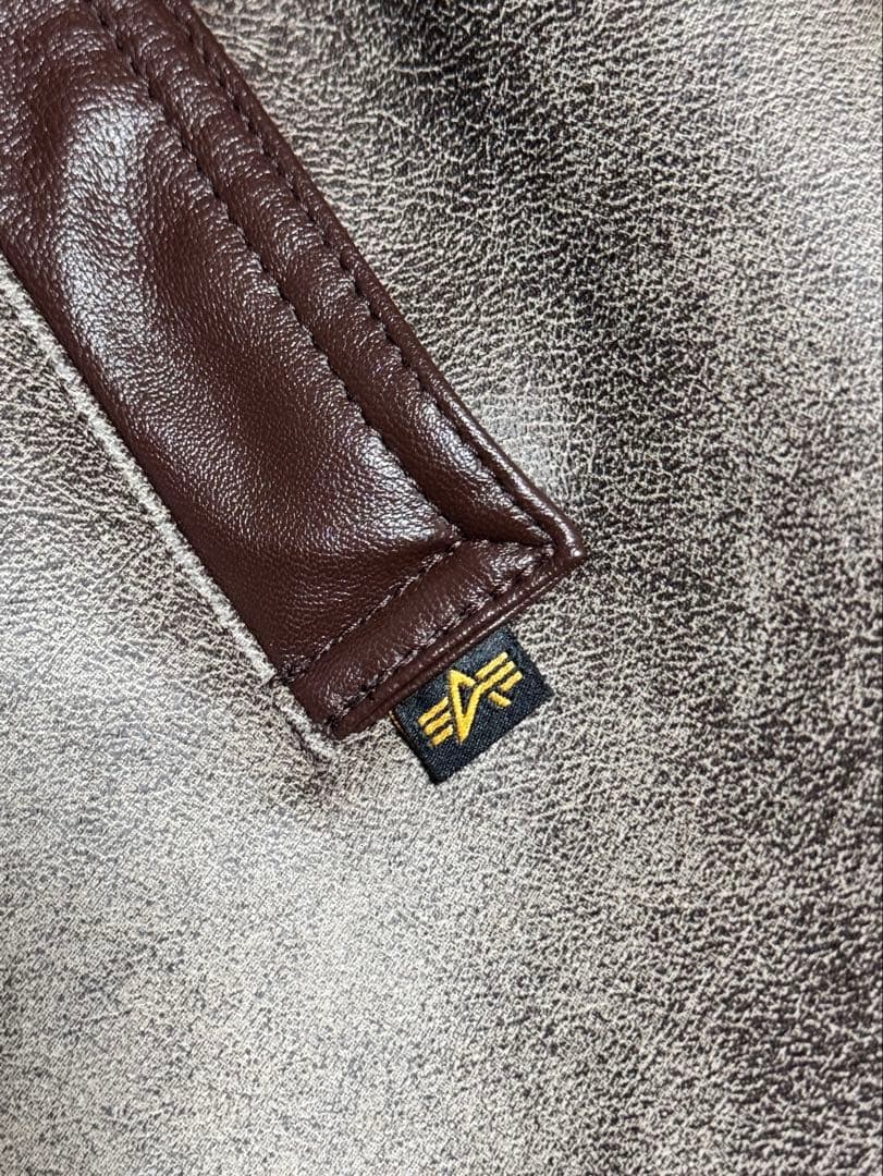 ALPHA INDUSTRIES B-3 フェイクムートンフライトジャケット