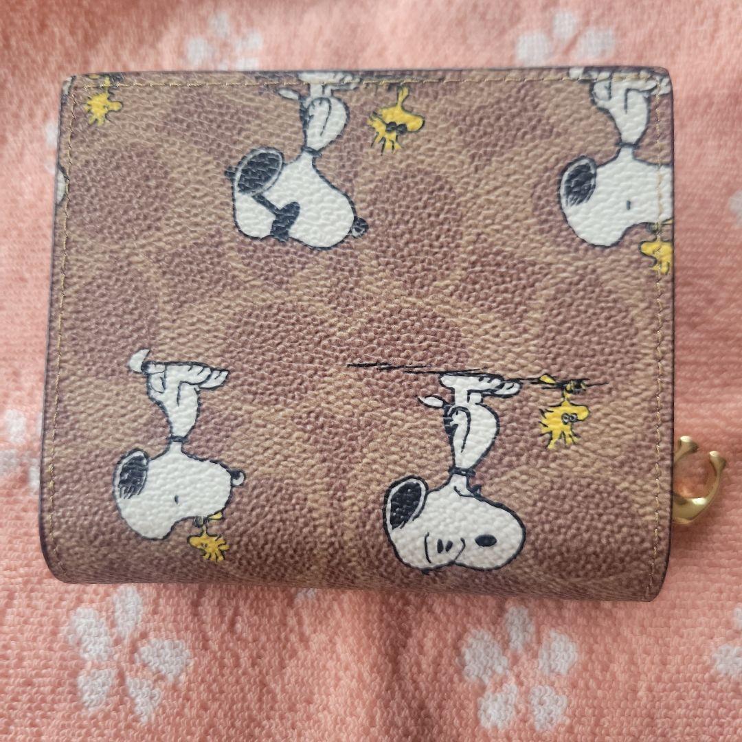 COACHコーチシグネチャースヌーピーコラボ二つ折り財布