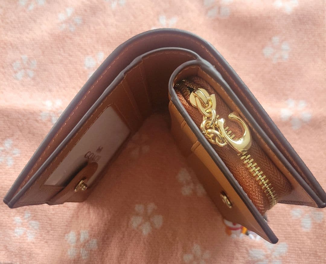 COACHコーチシグネチャースヌーピーコラボ二つ折り財布